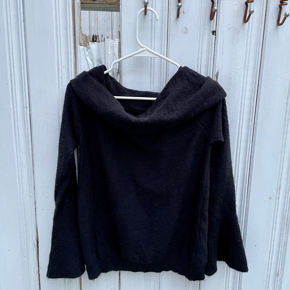 Off the shoulder black Love More knitted sweater.